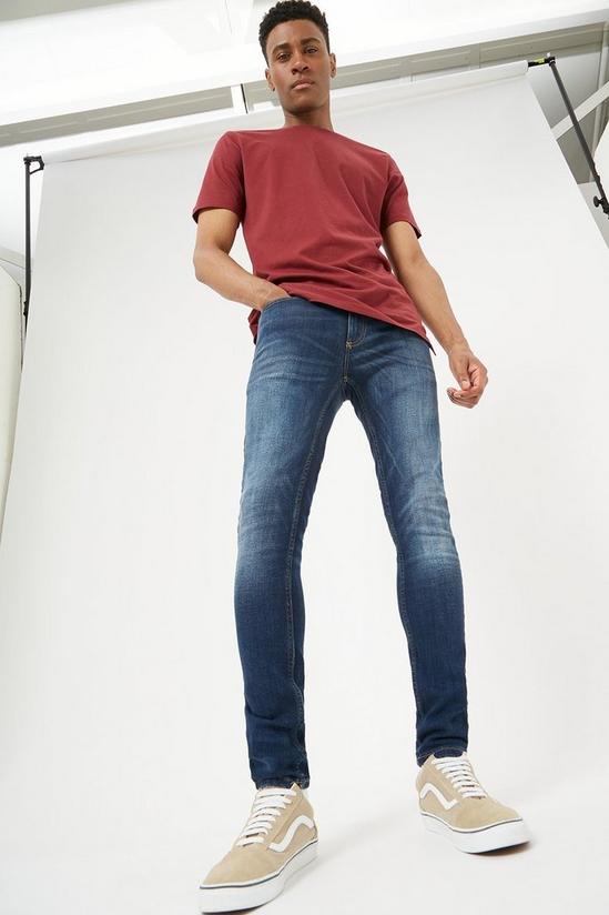 Burton Super Skinny Mid Wash Jeans 1