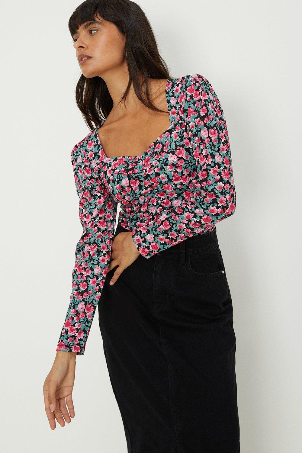 Missguided wrap bodysuit with frill cuff in black floral