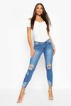 boohoo Mid Rise Distressed Knee And Ankle Skinny Jeans thumbnail 1