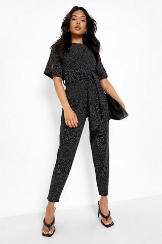 Black lace top + culotte pants date night outfit by extra petite