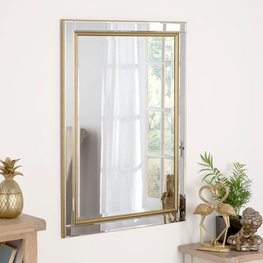 Brass framed bevelled mirror 91x66cm