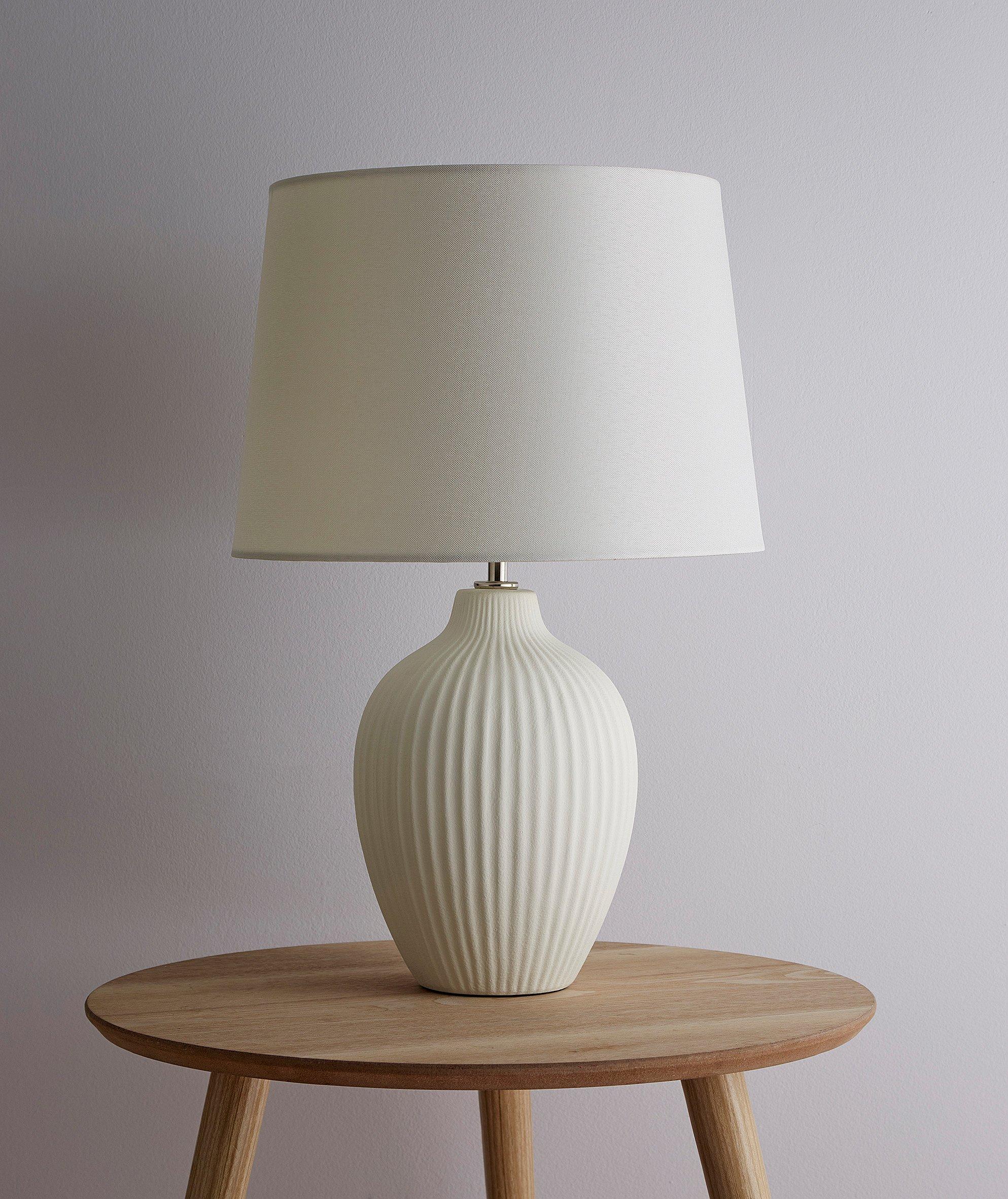 Ceramic Table Lamp with a Cream Textured Base and a Cream Tapered Lamp Shade to Match