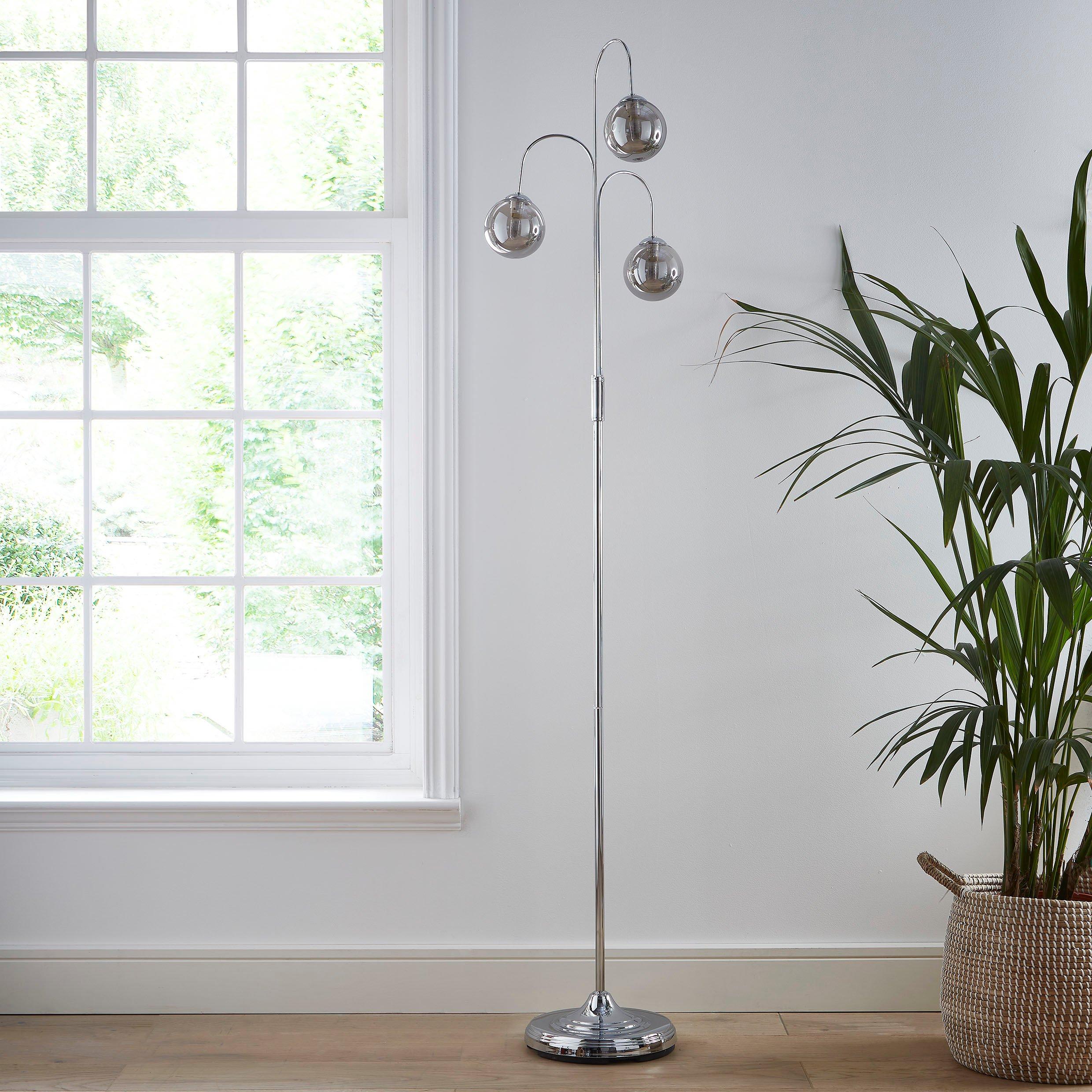 Chrome 3 light Floor lamp with smokey grey colour glass shades providing a modern home feel