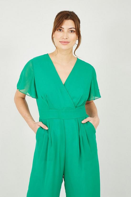 Yumi Green Jumpsuit With Angel Sleeves 2