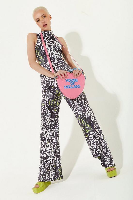 House of Holland Heart Shape Cross Body Bag In Pink With A Chain Detail And Printed Logo 1