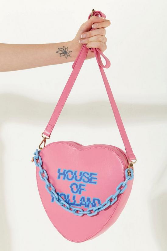 House of Holland Heart Shape Cross Body Bag In Pink With A Chain Detail And Printed Logo 2