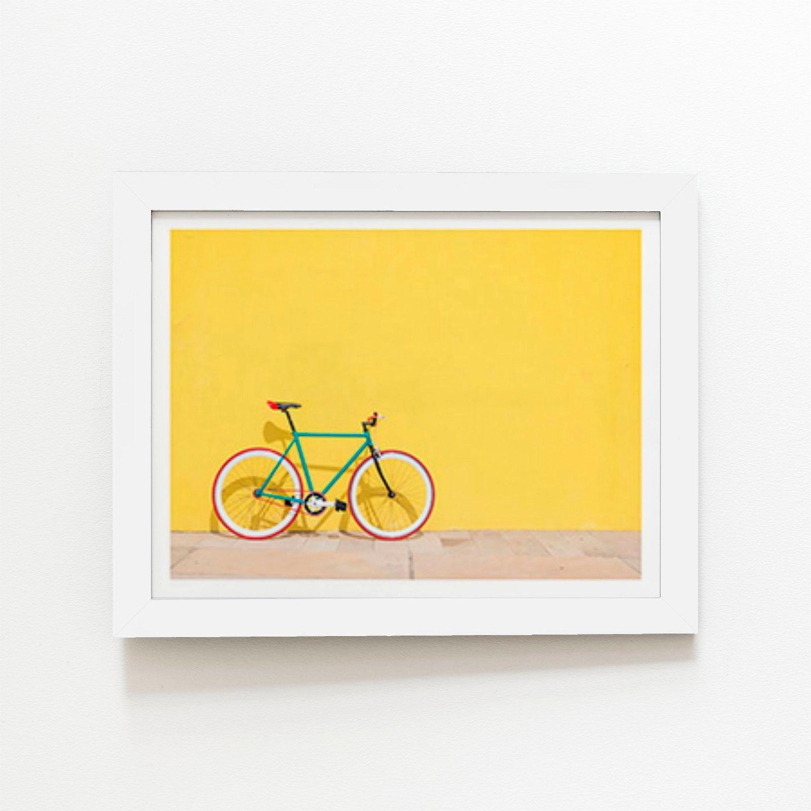 Bike Against Yellow Framed Art Print