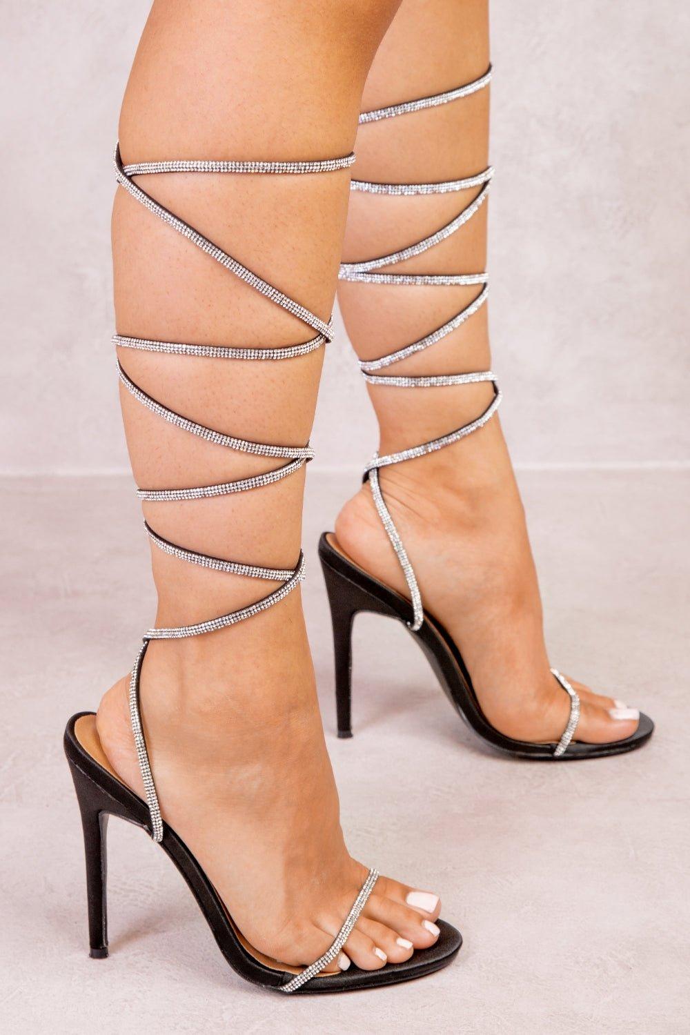 ASOS DESIGN Wide Fit Hideout strappy tie leg mid block heeled sandals in  black | ASOS