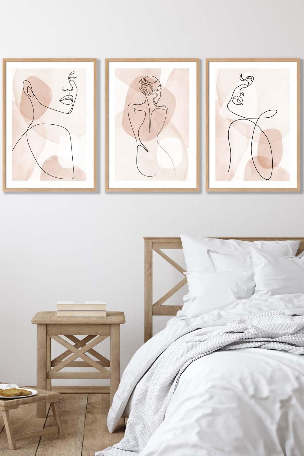 Set of 3 Oak Framed Coral Pink Abstract Line Art Female Wall Art