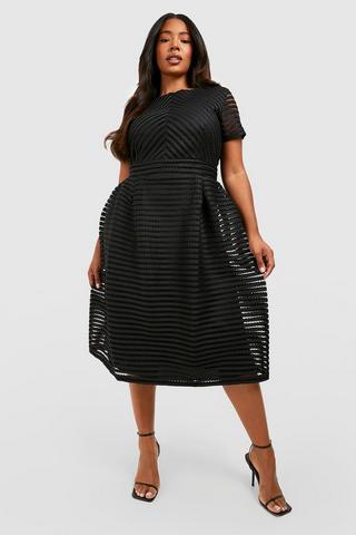 Close up of young beautiful plus size model in black dress, xxl