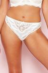 Gorgeous Ivory Satin And Lace Ruby Thong thumbnail 1