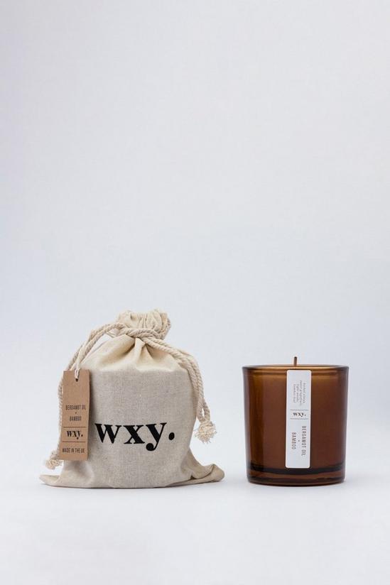 Wxy Amber 5oz - Bamboo & Bergamot Oil Candle 1